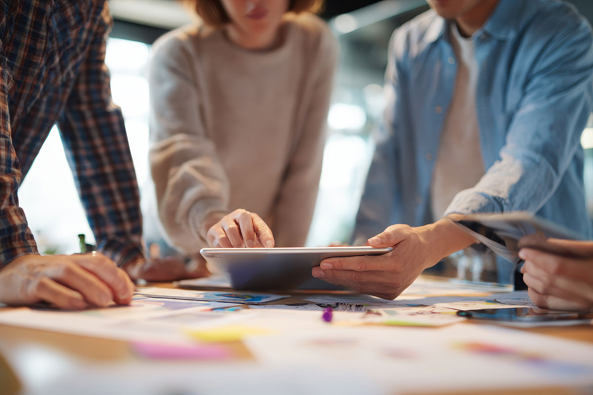 Digital team working on a tablet
